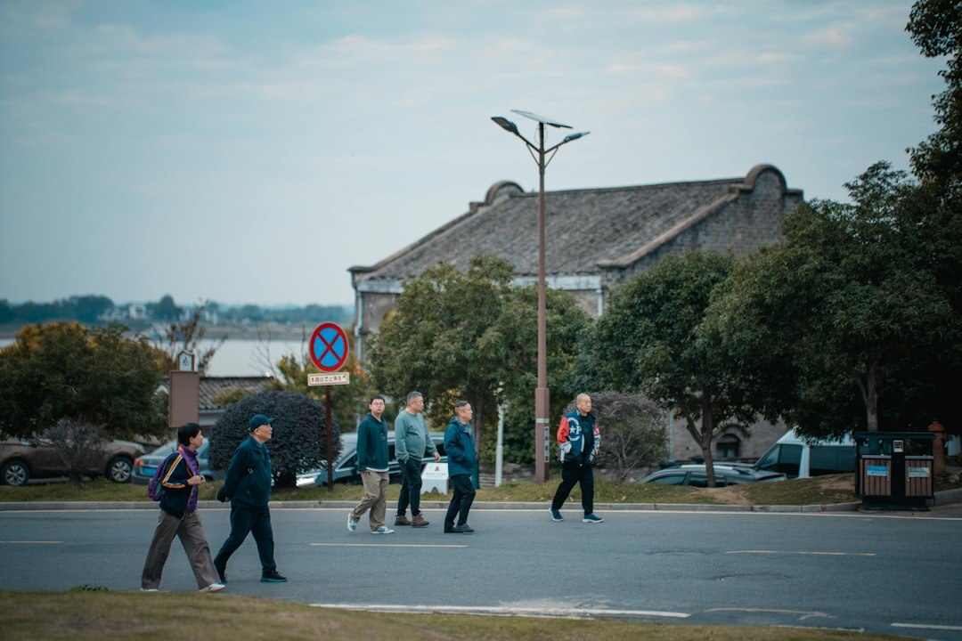 senior couple walking in neighborhood